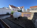Zweifamilienhaus in der City - Der intere Garten mit Flüssiggastank und Gemüsebeeten