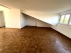 Dreizimmer Dachterrassenwohnung in historischer Umgebung - Wohnzimmer